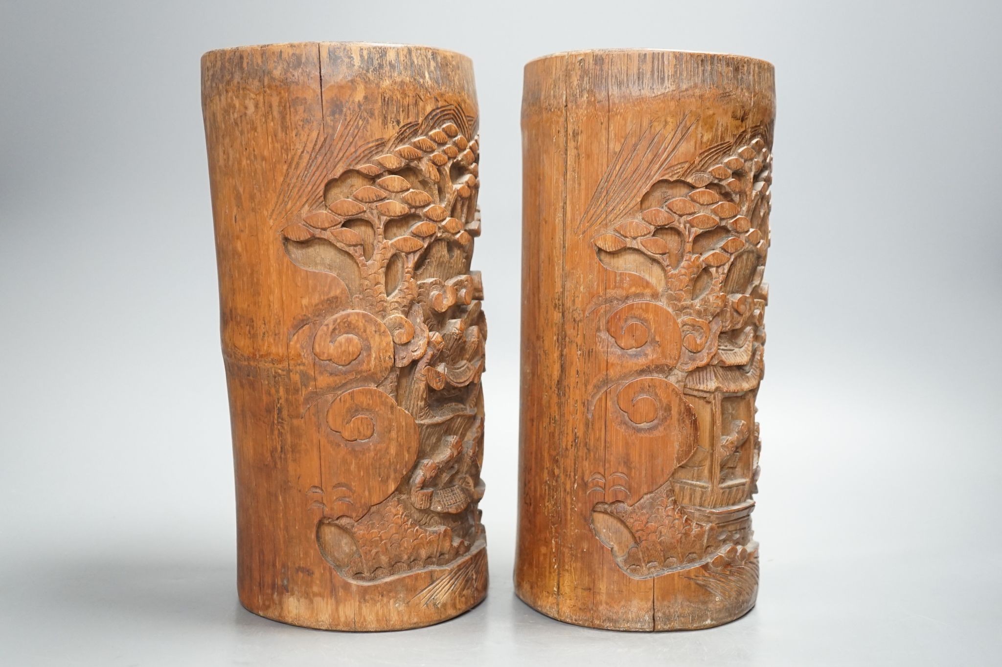 A pair of Chinese carved bamboo brush pots 25cm